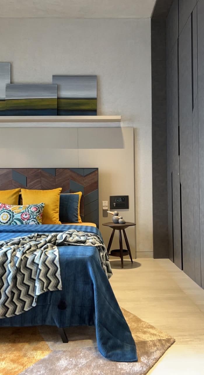 A Residential Flat — The main bedroom, behind a chevron headboard wall